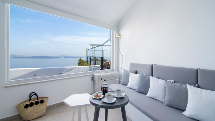 Living Room with a View at Santorini Secret Suites & Spa